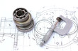 Three ball bearings over and over with micrometer on technical d Three ball bearings over and over with micrometer on technical d