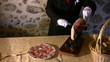 Waiter cut ham.