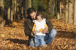 father with daughter in the autumn park father with daughter in the autumn park