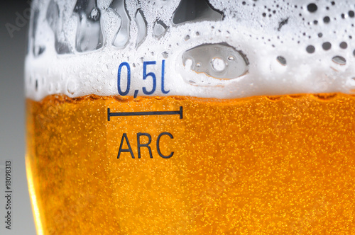 Glass of the beer with foam