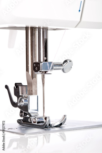 Photo: Needle plate, foot and transporter of a sewing machine Needle plate, foot and transporter of a sewing machine