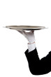 A butler's gloved hand holding a silver tray