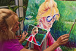 female artist painting a self portrait female artist painting a self portrait