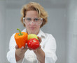 Female Scientist Offering Natural Food Female Scientist Offering Natural Food