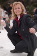 woman throwing snowball woman throwing snowball