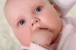 a young and beautiful baby in pink