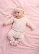 a young and beautiful baby in pink