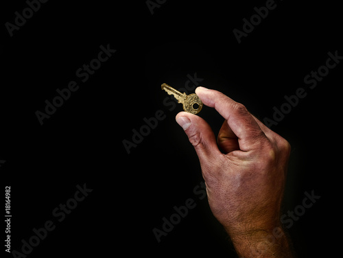 Photo: Holding key Holding key