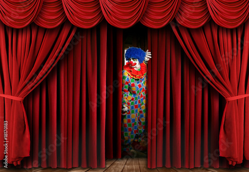 Photo: Clown on Stage Behind Curtain Clown on Stage Behind Curtain