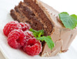 Fresh chocolate cake with raspberries