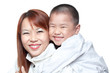 Asian Chinese boy hugs mum