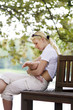 Nursing baby in the park