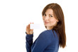 Young woman holding blank business card smiling