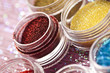 Foto: Colorful brocade, shiny cosmetic in vibrant colors Colorful brocade, shiny cosmetic in vibrant colors