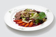 Photo: Salad from duck meat, oranges, leaves of salad and nuts and sauc Salad from duck meat, oranges, leaves of salad and nuts and sauc