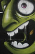 visage vert et bouche ouverte