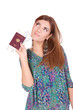 Excited traveler with her passport Excited traveler with her passport