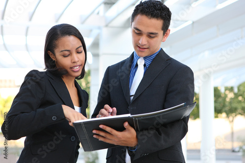 Photo: Diverse Business Team at Office Building Diverse Business Team at Office Building