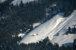 Schneewaldalpe Almhütte tief verschneit mit Schispuren
