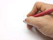 Pencil in man hand isolated on white background.