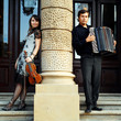 Two musicants with instruments