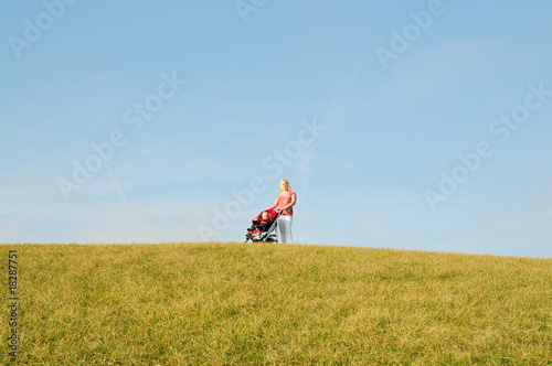 Photo: Mother with stroller Mother with stroller