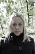 Blonde woman in woods