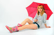 girl woman sitting with red umbrella