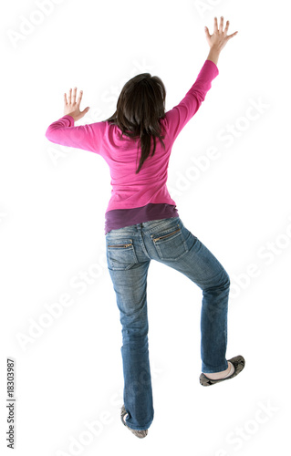 Photo: woman climbing a wall woman climbing a wall