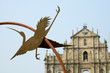 Statue of egret and Cathedral