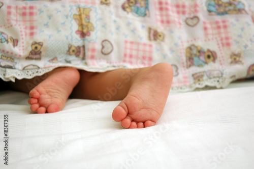 Photo: baby feet on bed baby feet on bed