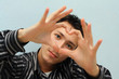 Asian, constituting the shape of the heart of the fingers