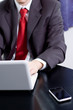 Foto: Businessman with his notebook and smartphone Businessman with his notebook and smartphone