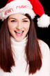 Pretty woman wearing santa hat