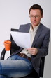 bisinessman reading paperwork