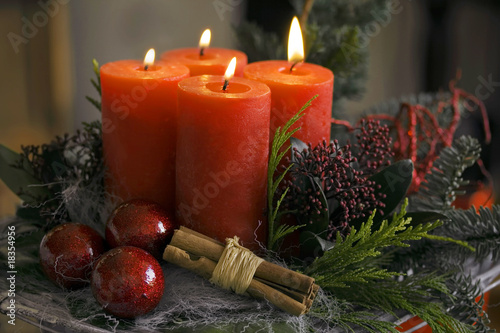 Advent wreath with red candlelit