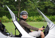 Woman pilot sitting in the autogyro