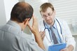 Patient telling symptoms to doctor