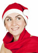 The beautiful girl smiles in a New Year's cap The beautiful girl smiles in a New Year's cap