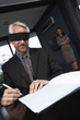 Man signing a contract