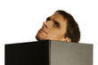 man behind the open book on white background