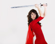 young beautiful girl with a sword in hands young beautiful girl with a sword in hands