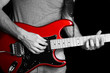 man playing electrical guitar