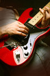 man playing electrical guitar