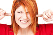 unhappy redhead woman