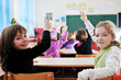 happy teacher in school classroom happy teacher in school classroom