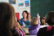 happy teacher in school classroom happy teacher in school classroom