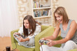Students - Two female teenager playing video TV game
