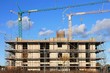 Baukrane, Krane, Hochbau, Hausbau, Wolkenhimmel Baukrane, Krane, Hochbau, Hausbau, Wolkenhimmel