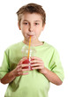 Child drinking a fresh berry fruit juice